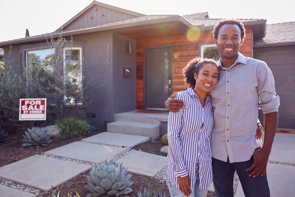 home for sale by owner with couple standing in front